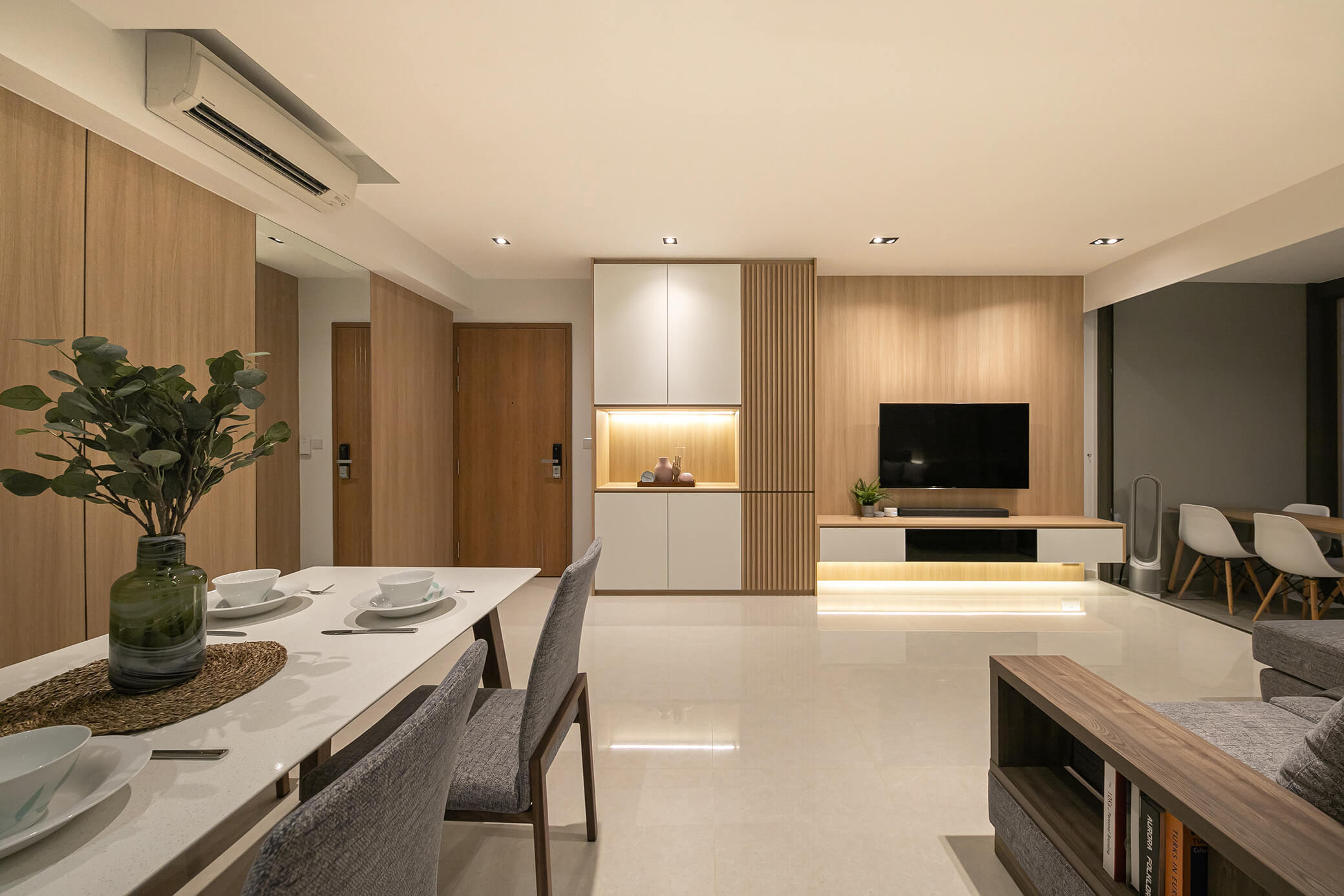 Modern kitchen renovation with island seating and sleek black cabinetry