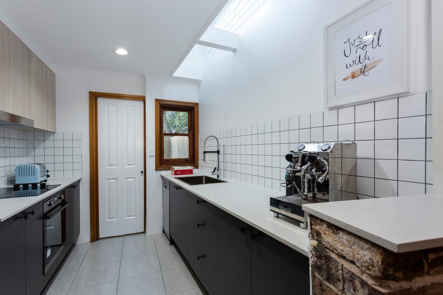 Modern kitchen with grey cabinets